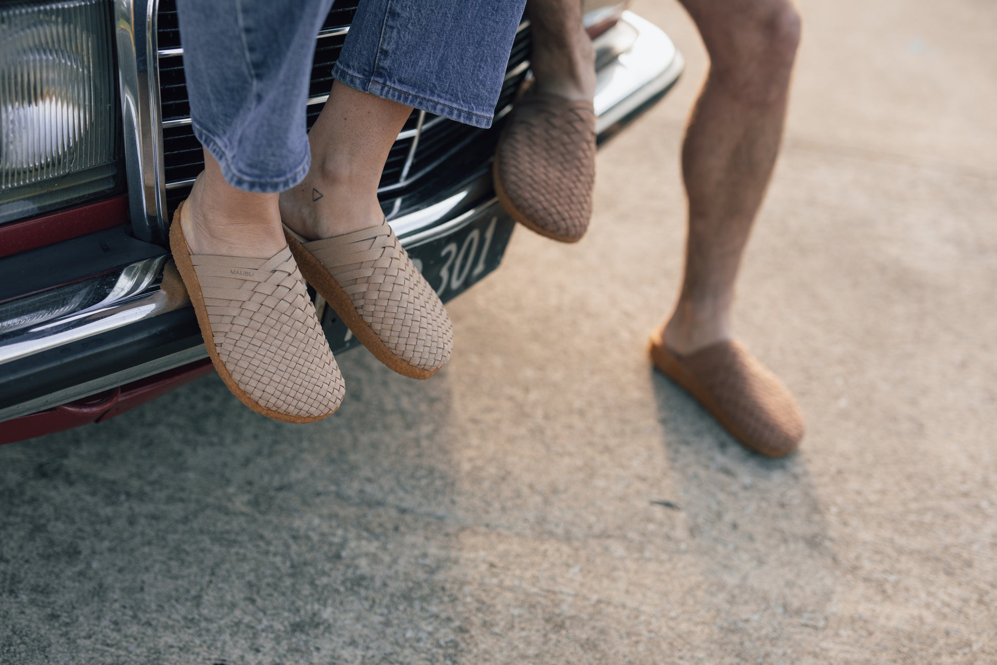 close up shot of two people feet wearing Malibu Sandals Vegan Suede and Crepe Sole Colony Sandal